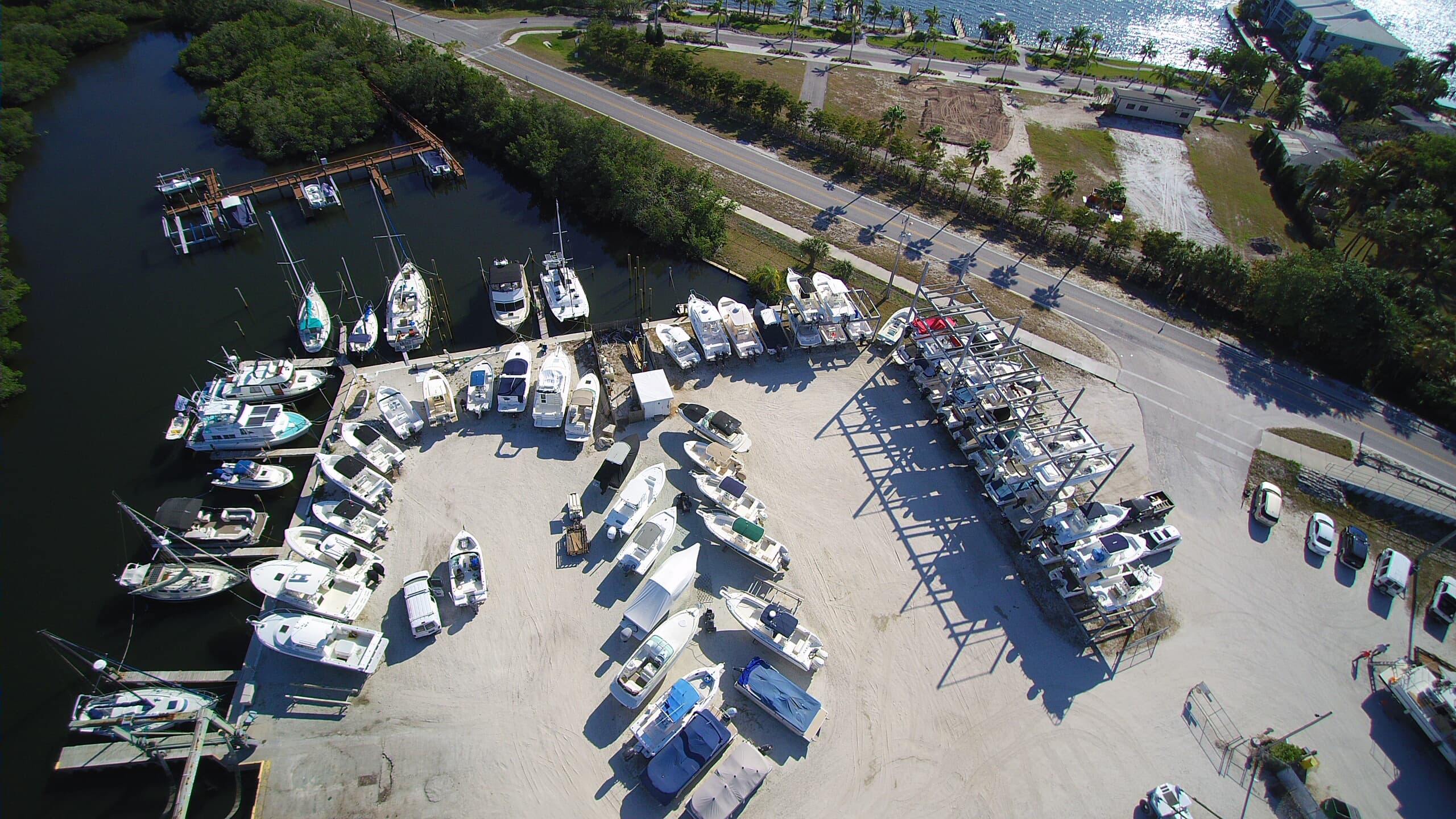 Boats stored in Cut's Edge Harbor Marina's DIY yard and high-and-dry racks